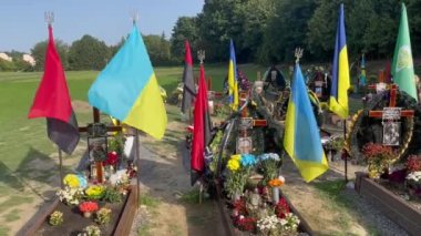 Lviv, Ukraine - August 24, 2022: Graves of fallen Ukrainian soldiers killed during the Russian invasion of Ukraine.