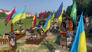 Lviv, Ukraine - August 24, 2022: Graves of fallen Ukrainian soldiers killed during the Russian invasion of Ukraine.