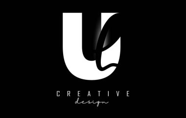 Siyah ve Beyaz Harfler UL logosu. Minimalist bir tasarımı var. Geometrik ve el yazısıyla yazılmış U ve L harfleri.