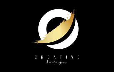 Beyaz Harf O logosu altın fırça darbesi ve siyah arka planda yaratıcı kesik.