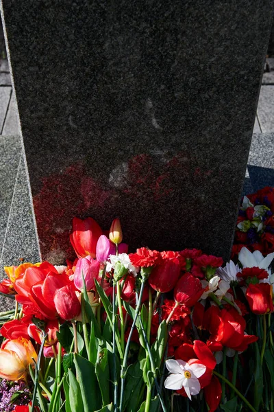 Bunch Different Flowers Empty Marble Gravestone Tulips Carnations Victory Day — Stock Photo, Image