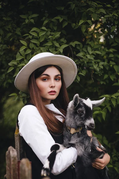 Beautiful Stylish Girl White Blouse Black Vest White Hat Holds — Stock Photo, Image