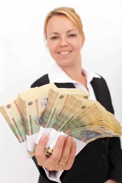 Woman handing you a stack of romanian currency — Stock Photo, Image