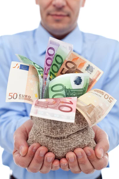 Businessman hands with euro banknotes in a money bag — Stock Photo, Image