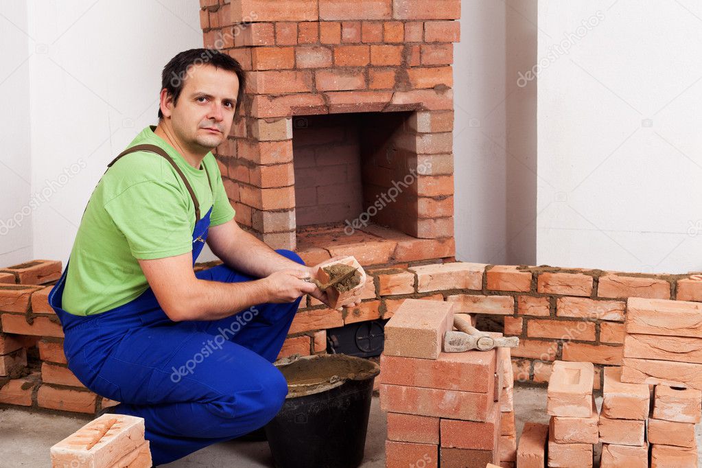 Masonry Worker Building Fireplace Stock Photo C Lightkeeper