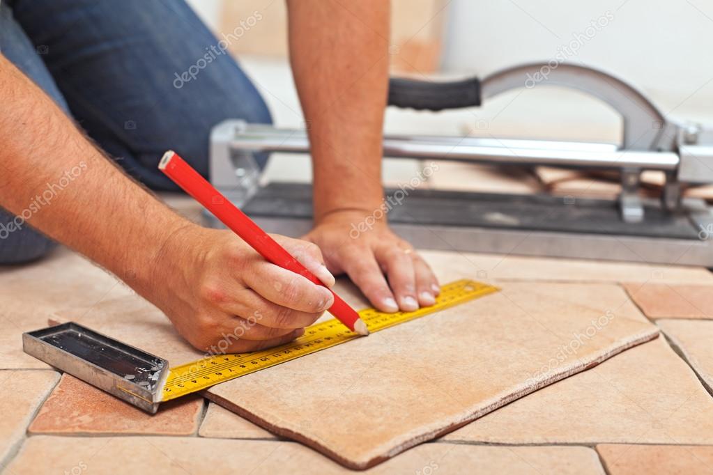 Laying Ceramic Floor Tiles Man Hands, How To Lay Hall Tiles