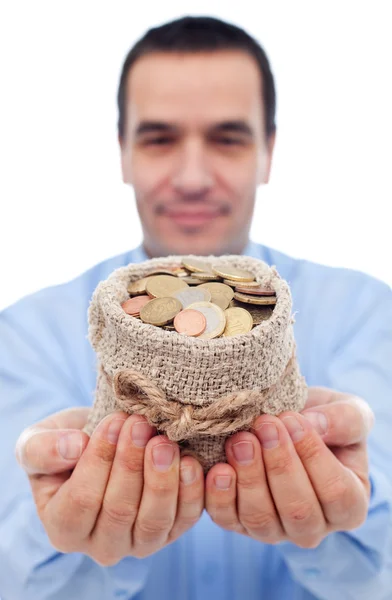 Empresário com um saco de moedas de euro — Fotografia de Stock