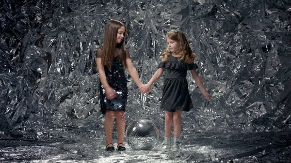 Two Girls Shiny Background Girls Festive Dresses Girls Background Shiny — kuvapankkivalokuva