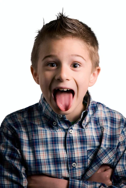 Kid tongue out isolated on white — Stock Photo, Image