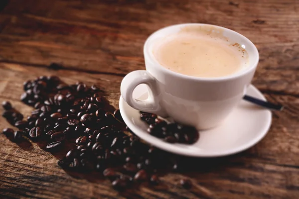Hot espresso cappuccino tilt shift effect — Stock Photo, Image
