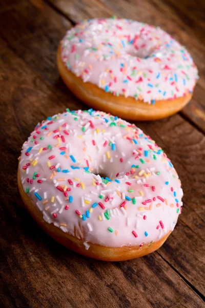 Donut with colorful sprinkles — Stock Photo, Image