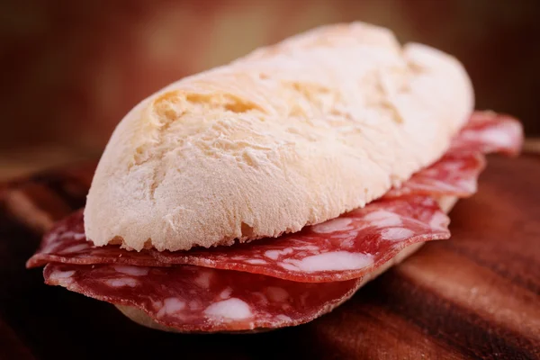 French bread sandwitch with salami — Stok Foto