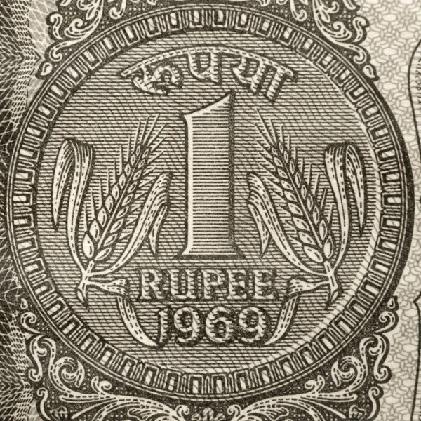 Um símbolo de rupia — Fotografia de Stock