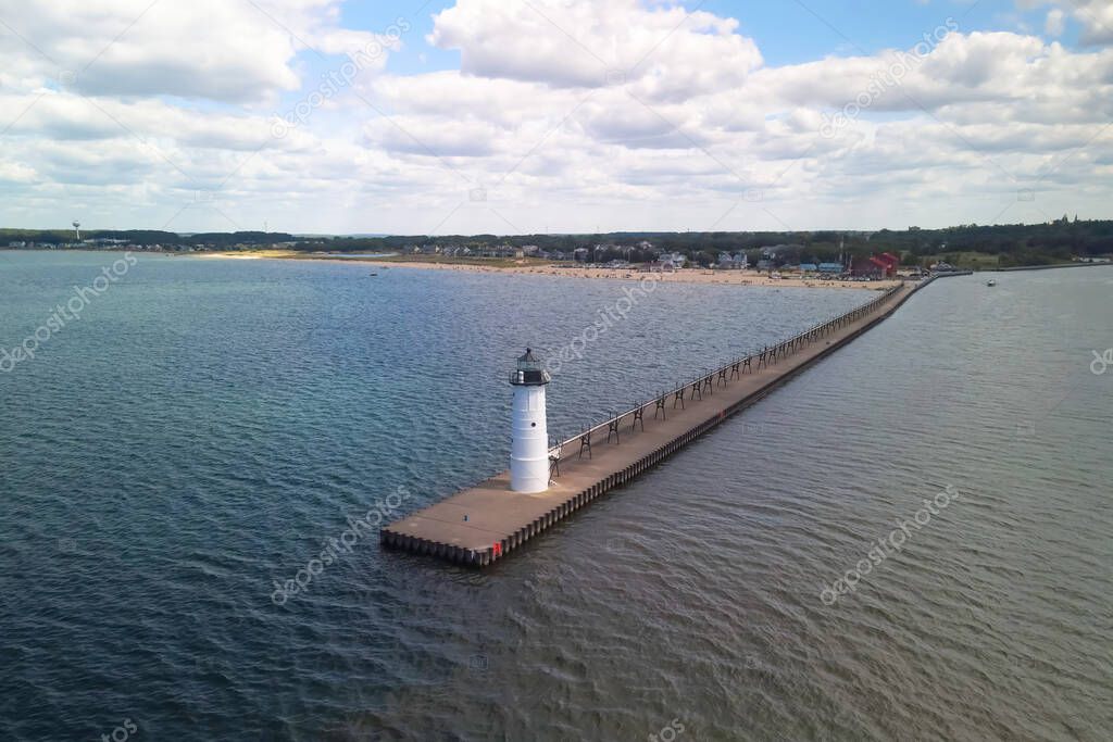 Aerial view of Manistee light house at lake Michigan shore line