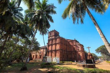 OLD GOA, INDIA - JANUARY 03, 2019: Exterior view of Basilica of Bom Jesus, completed in 1605, this Baroque Catholic church contains the tomb of Saint Francis Xavier.