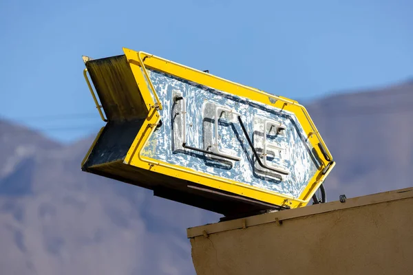 Old Weathered Yellow Sign Board Letters Ice — Zdjęcie stockowe