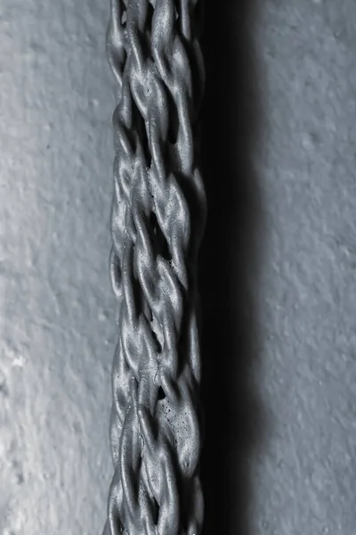Extreme close up shop of painted Nylon rope in monochrome
