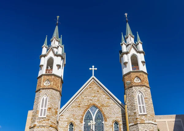 St. Mark\'s Episcopal Church in Grand Rapids downtown against blue sky.