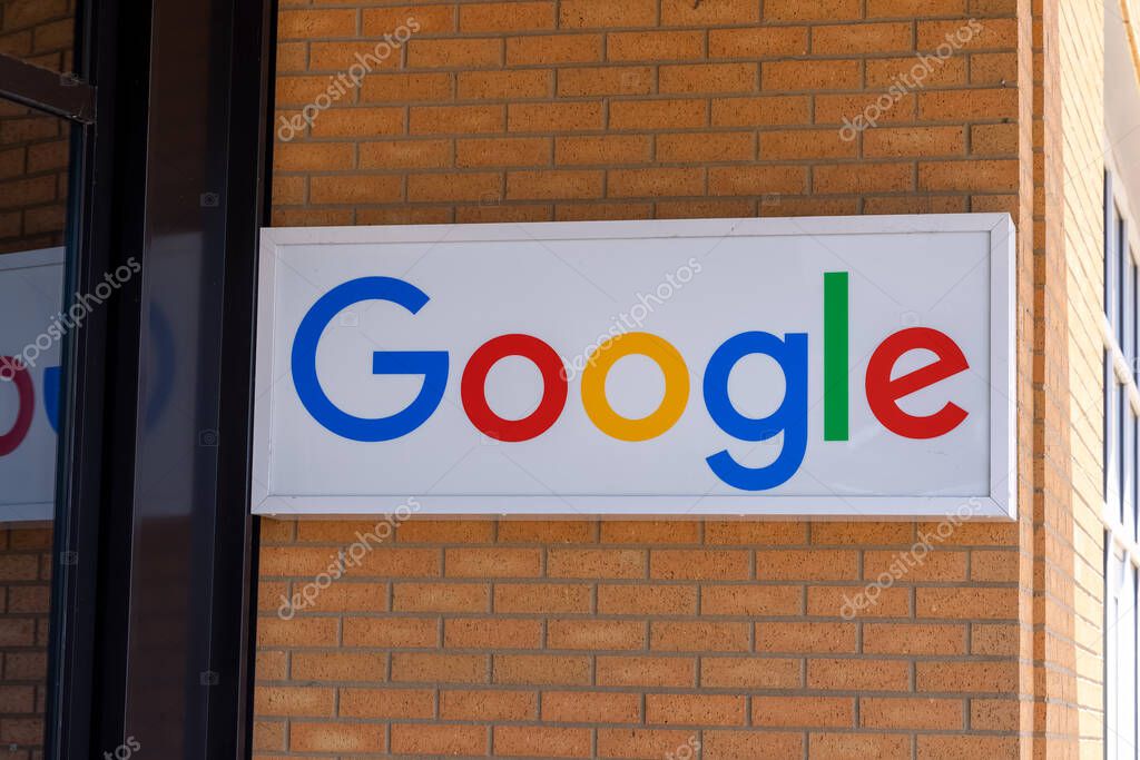 Detroit, Michigan, USA - May 30, 2022: Google sign at the entrance of office building in Detroit, Michigan. Google LLC is world famous Information technology, e-commerce and advertising company.