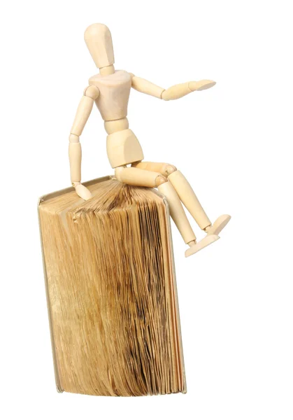 Wooden man and book — Stock Photo, Image