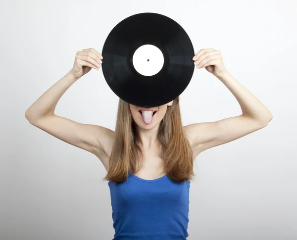 Menina com disco de vinil, isolado em branco — Fotografia de Stock