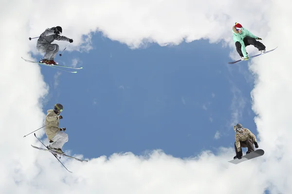 Cloudy frame with skiers — Stock Photo, Image