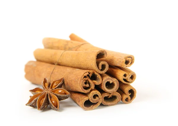 Cinnamon and star anise, isolated on white — Stock Photo, Image