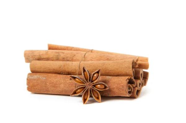 Cinnamon and star anise, isolated on white — Stock Photo, Image