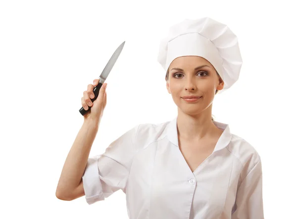 Bir mutfak bıçağı tutan üniformalı kadın aşçı — Stok fotoğraf