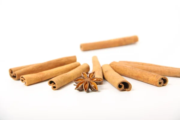 Cinnamon and star anise, isolated on white — Stock Photo, Image