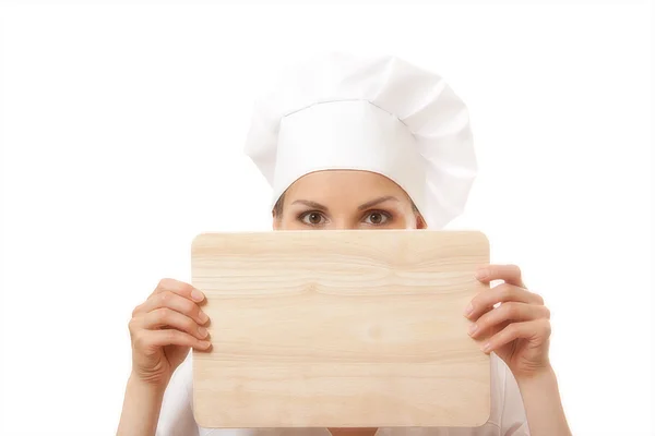 Vrouw chef-kok in uniform met snijplank, geïsoleerd — Stockfoto