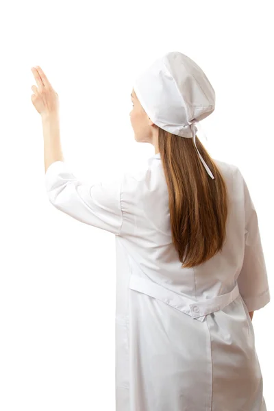 Woman doctor presses on a virtual button — Stock Photo, Image