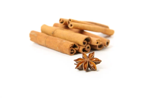 Cinnamon and star anise, isolated on white — Stock Photo, Image