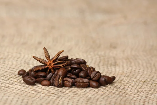 Coffee and Star Anise on sackcloth with copyspace — Stock Photo, Image