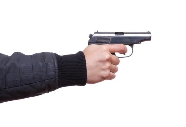 Пистолет в руке мужчины — стоковое фото