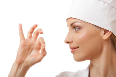 Şef baker veya ok işaret gösteren aşçı