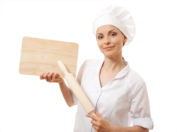 Vrouw chef-kok in uniform met snijplank, geïsoleerd — Stockfoto