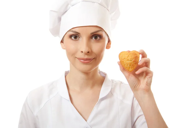 Mujer cocinera sosteniendo pastel —  Fotos de Stock