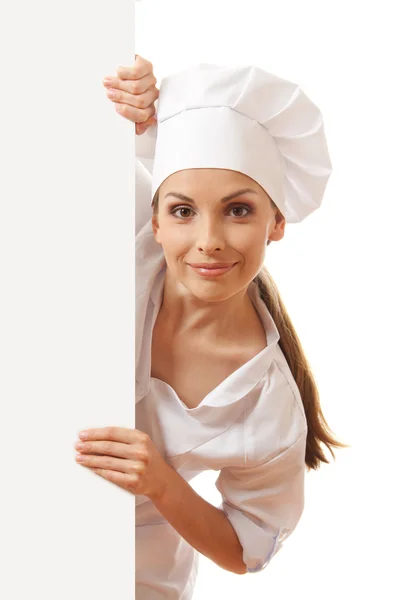 Женщина-повар, пекарь или повар с белой бумажной вывеской — стоковое фото