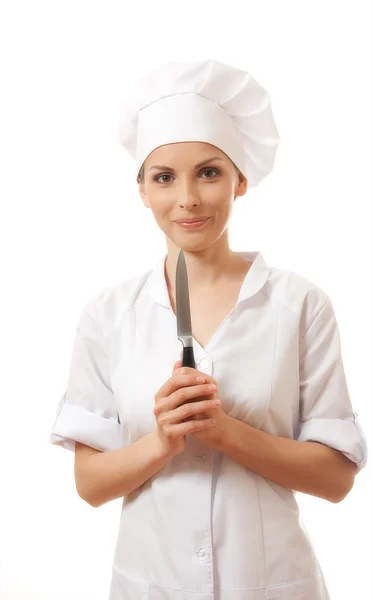 Vrouw chef-kok in uniform houden een keukenmes — Stockfoto