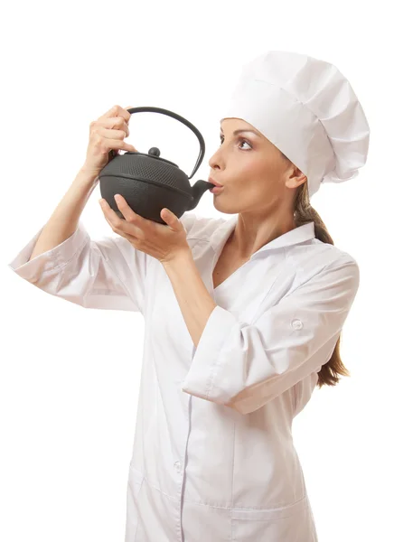 Cocinera / chef en uniforme con tetera — Foto de Stock