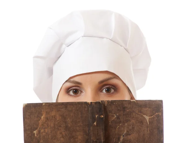 Mulher cozinhar livro de receitas de leitura — Fotografia de Stock
