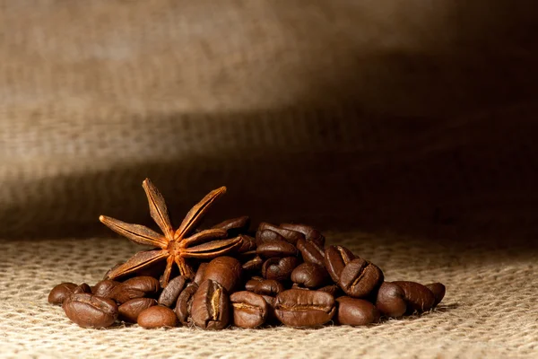 Coffee and Star Anise on sackcloth with copyspace — Stock Photo, Image