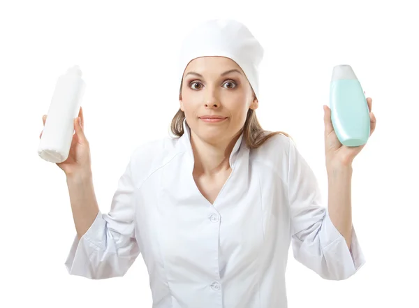 Doctor holding new medicine in plastic bottle. — Stock Photo, Image