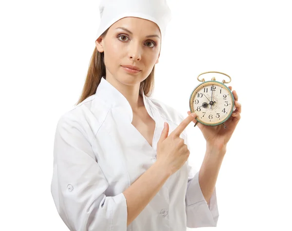 Vrouwelijke arts bedrijf alarm clock, geïsoleerd — Stockfoto