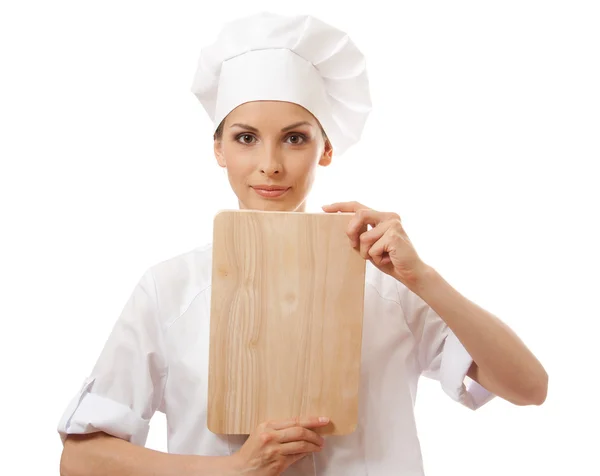 Vrouw chef-kok in uniform met snijplank, geïsoleerd — Stockfoto