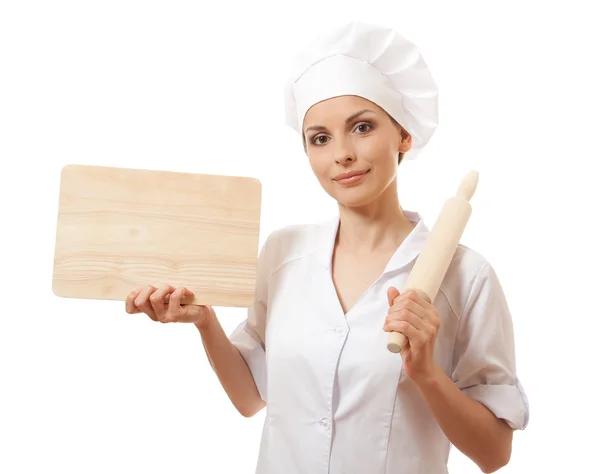 Mujer Chef en uniforme con tabla de cortar, aislado —  Fotos de Stock