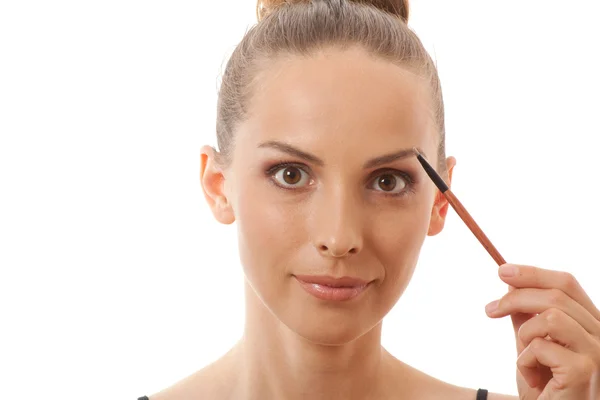 Vrij volwassen vrouw maken make-up — Stockfoto