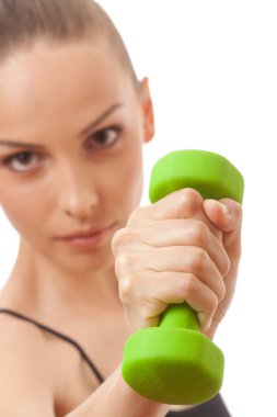 Kadın spor yapıyor.
