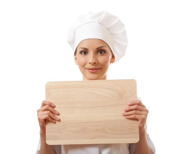 Mujer Chef en uniforme con tabla de cortar, aislado —  Fotos de Stock